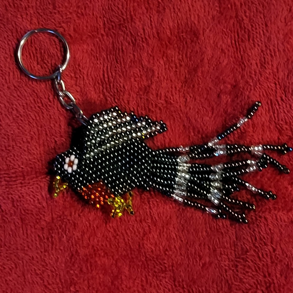 Finely beaded bird keychain